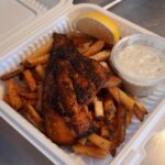 A photo of our Blackened Fish and Fries at Loaves and Fishes Family Kitchen in Temiskaming Shores. Fish and chips for Elk Lake and Earlton.