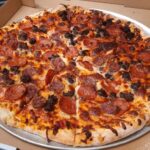 A photo of our Meat Lovers Pizza at Loaves and Fishes Family Kitchen in Temiskaming Shores.